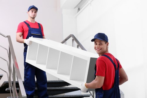 Professional movers handling house removals in a Fulwell property