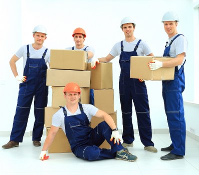 Loading furniture into a moving truck for a local Fulwell move