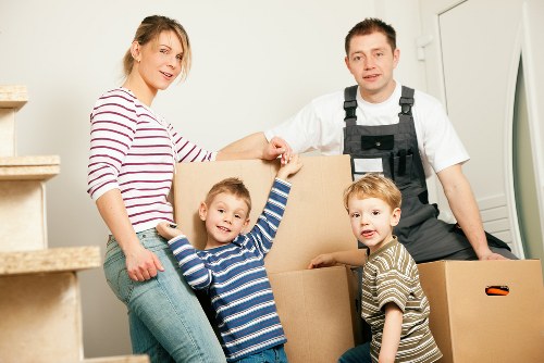 Moving team handling furniture and boxes for a flat move