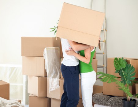 Household items being transported by a moving truck in Fulwell