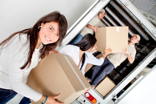 Local moving team working in a Fulwell property