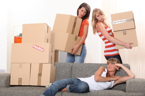 Packed moving boxes and protective wrapping ready for a Fulwell relocation