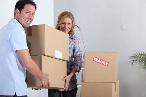 Loading furniture and boxes into a local removal van